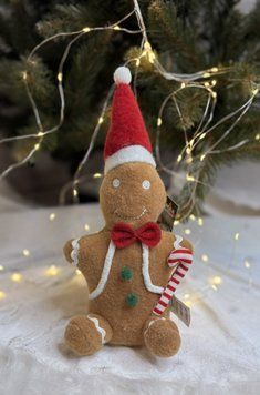 М&rsquo;яка іграшка "Пряник з цукровою тростиною" у шапці Санти SANTA-SOFT1 фото